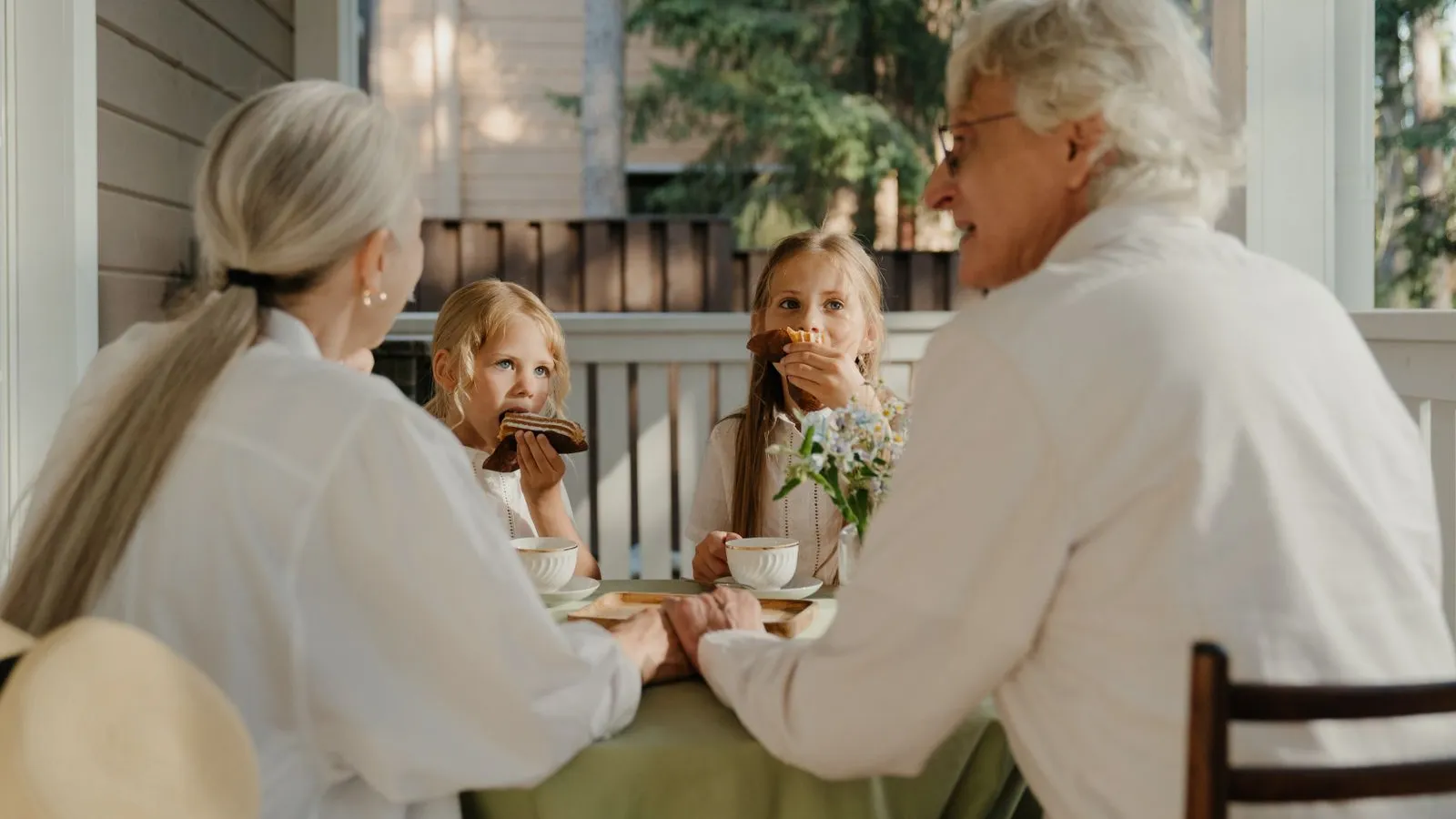 Grandparents and grandchildren of different generations together outdoors